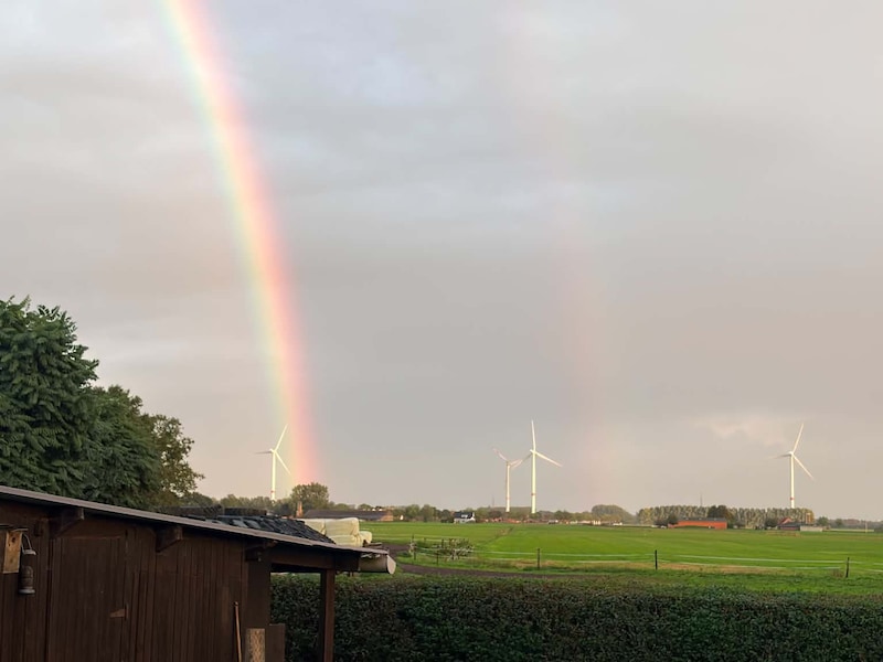 De dubbele regenboog boven Eeklo.