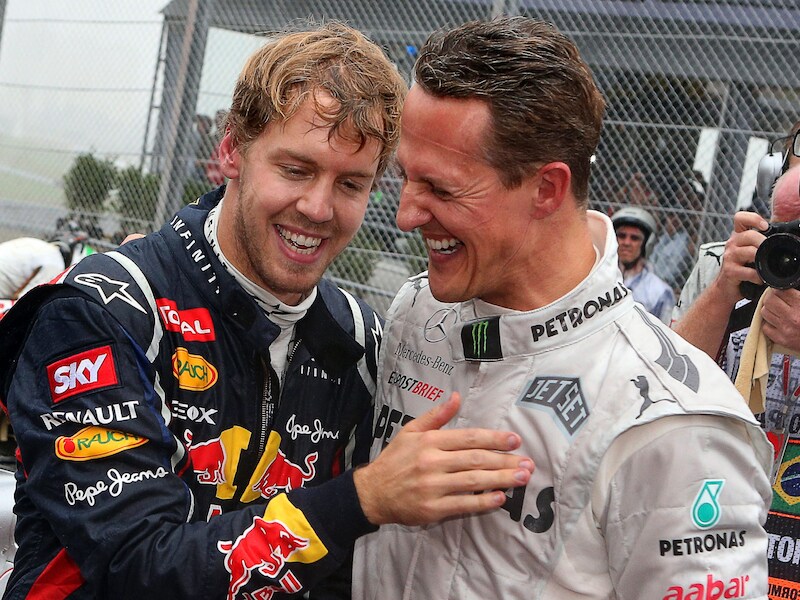 Vettel en Schumacher (r).