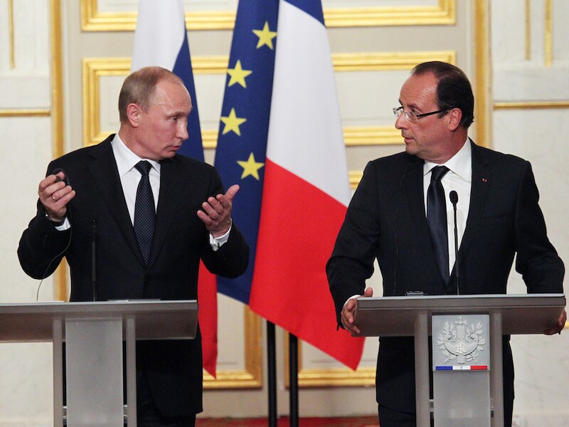 Poetin en Hollande spreken de pers toe.