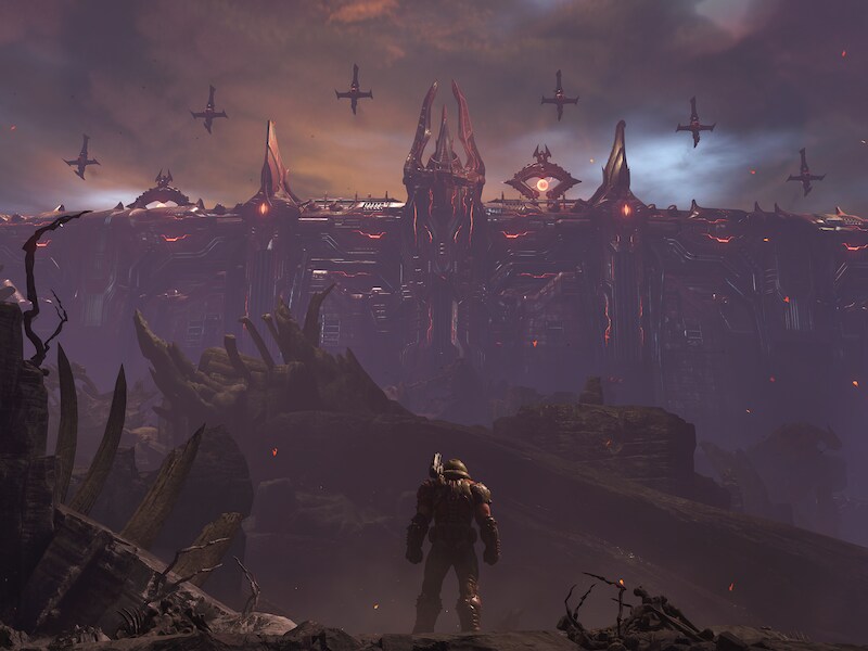De Doomslayer kijkt uit over het slagveld dat hij zo dadelijk zal betreden. 'Doom Eternal' maakte van de 'Doom'-reeks een moderne franchise, die een episch verhaal à la 'Halo' probeert te vertellen.