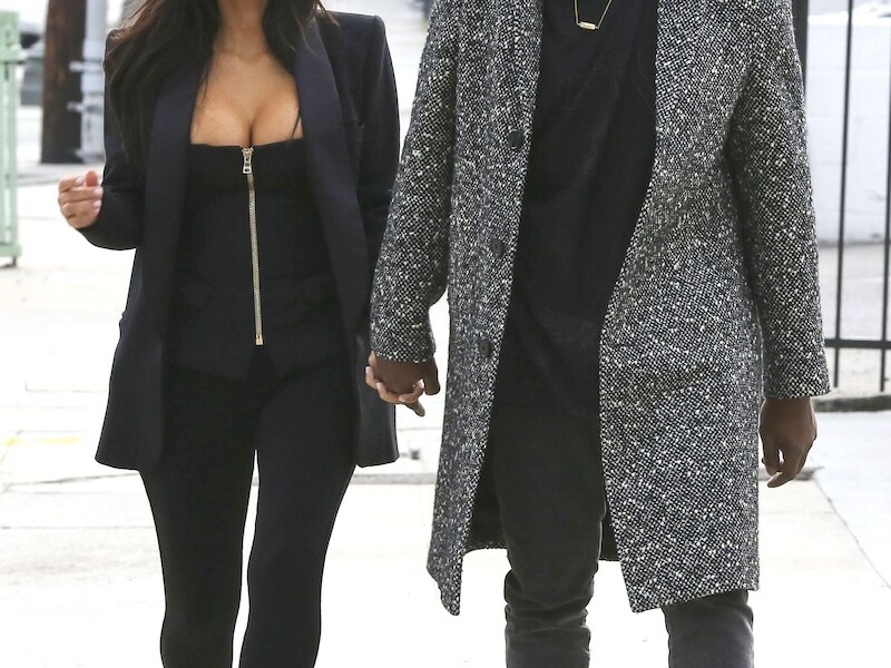 De kleine Kim Kardashian en haar man Kanye West.