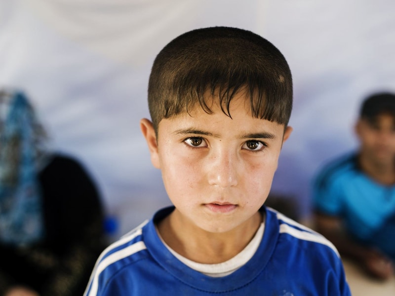 Kind in het vluchtelingenkamp Khazer in Irak op de vlucht voor de gruwel van ISIS.