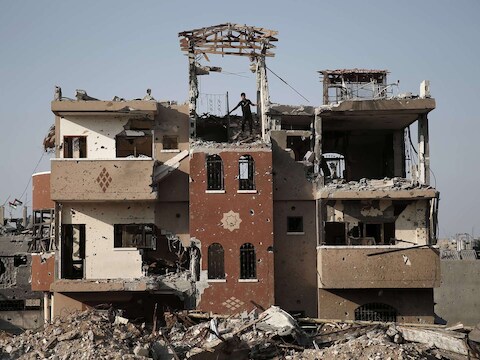 Vernielde huizen in de Shejaiya wijk in Gaza.