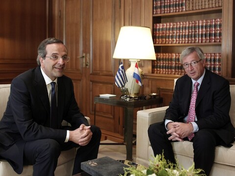 Jean-Claude Juncker (rechts) in gesprek met Grieks premier Antonis Samaras.