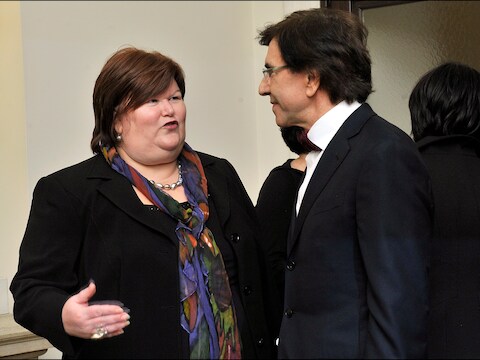 Staatssecretaris voor Asiel en Migratie Maggie De Block (L) en premier Elio Di Rupo (R).