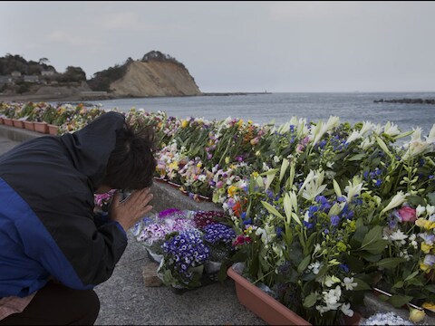 De tsunami kostte het leven aan 18.537 Japanners.