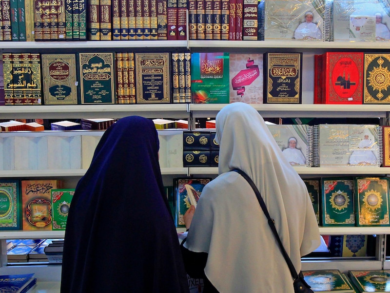 Archiefbeeld van enkele moslima's op een moslimbeurs in Brussel.