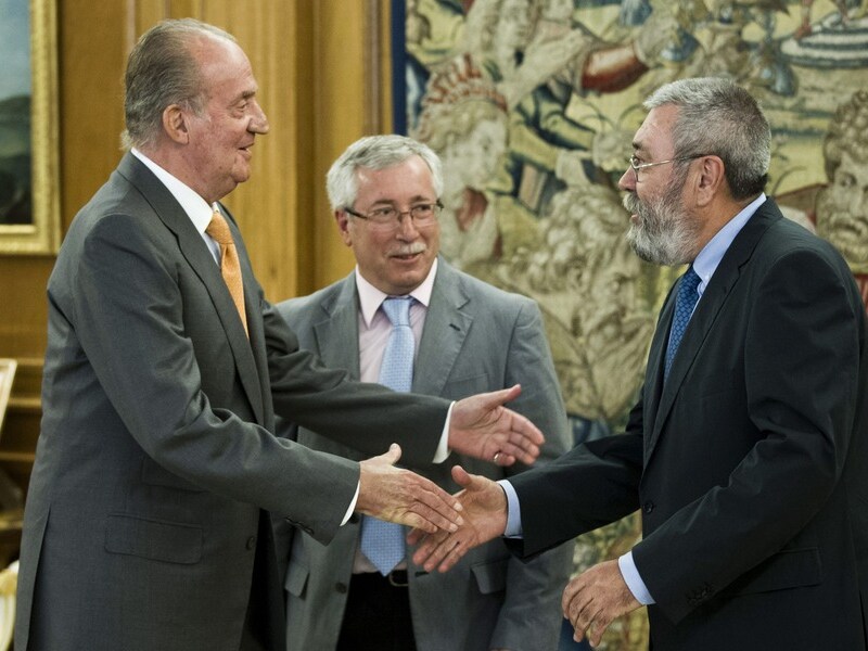 Juan Carlos met Candido Mendez en Ignacio Fernandez Toxo.