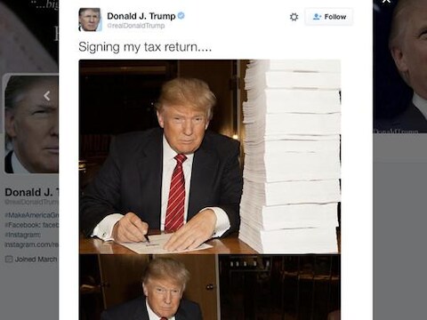 Tijdens de verkiezingscampagne gaf Donald Trump deze foto vrij waarin hij naar eigen zeggen zijn belastingaangifte ondertekent.