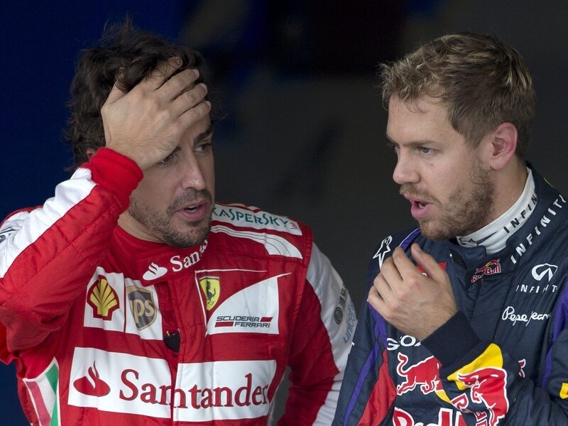 Ferrari-rijder Alonso (links) en Vettel