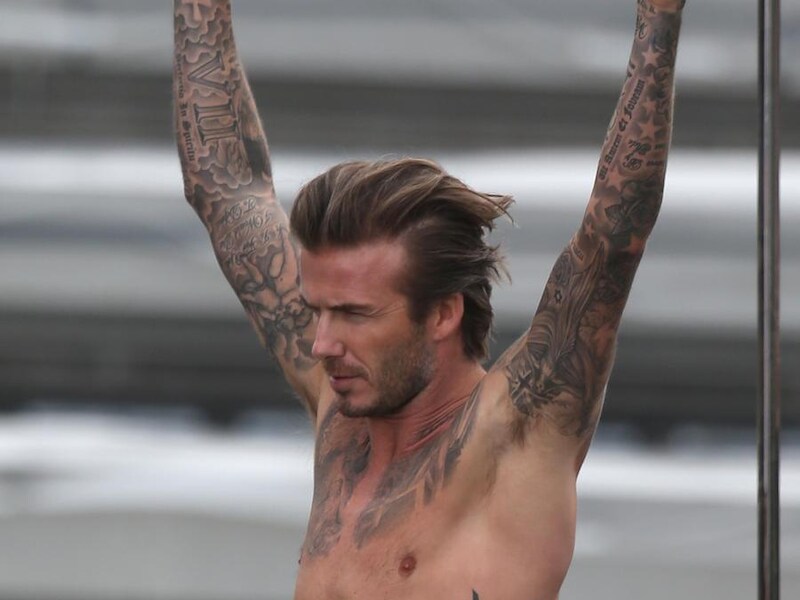 David Beckham op het dak in het oosten van Londen.