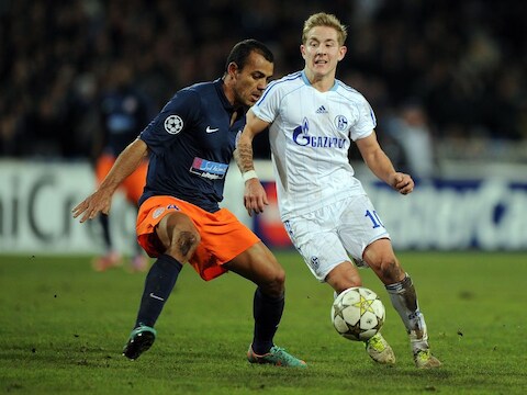 Holtby (r) in actie in de Champions League tegen Montpellier.