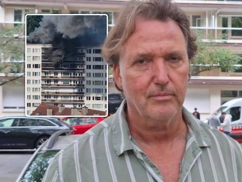 Walter Callebaut (63) moest door de brandweer op de achtste verdieping gered worden.