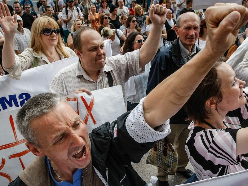 Betogers nemen deel aan een anti-holebimars in Kiev, in 2013.