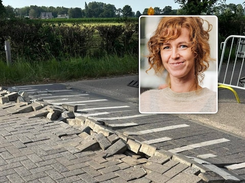 Katrien Kiekens van het Agentschap Wegen en Verkeer, en een beschadigd wegdek in Essen.