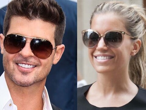 Robin Thicke en Sylvie van der Vaart hebben zich samen goed vermaakt.