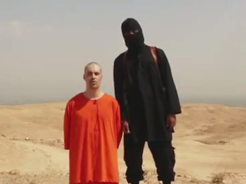 Wijlen James Foley met zijn moordenaar 'Jihadi John'
