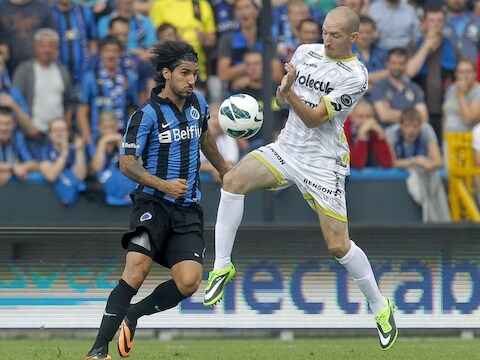 Franck Berrier, rechts, in een duel met Lior Refaelov om de bal