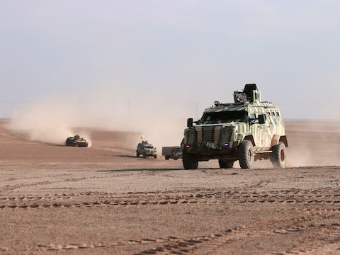 Strijders van de SDF (Syrian Democratic Forces) in de provincie Raqqa, op 6 februari.