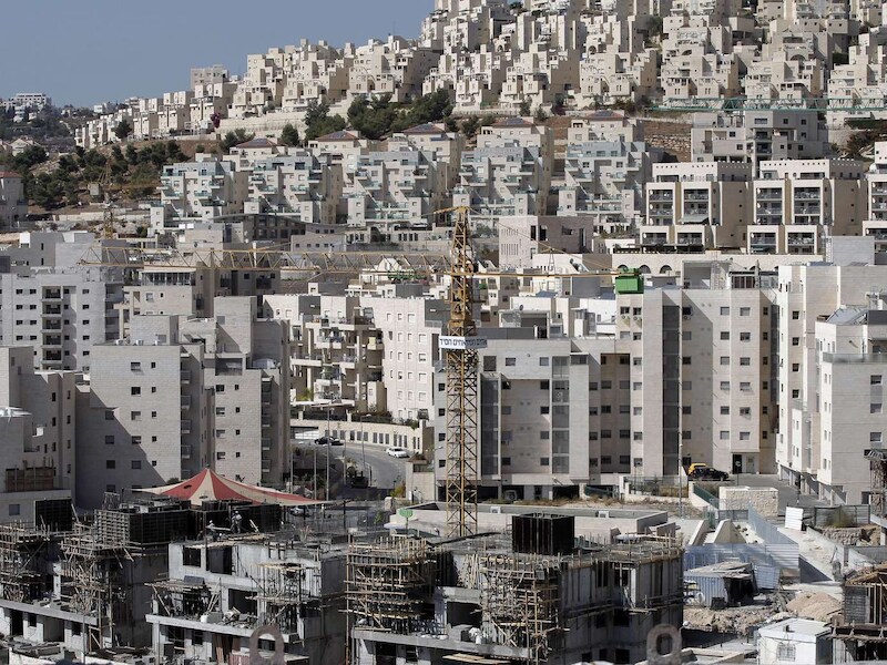 Een nederzetting in Oost-Jeruzalem. De Israëlische woningen in bezet gebied is een belangrijk obstakel voor de EU-ministers.