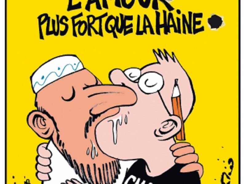 Nrc.next heeft de voorpagina in het ontwerp van een Charlie Hebdo-cover. De kop 'Liefde is sterker dan haat' staat boven een tekening van een moslim die zoent met een journalist van het tijdschrift.