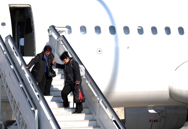 Reizigers na hun terugkomst uit Dubai