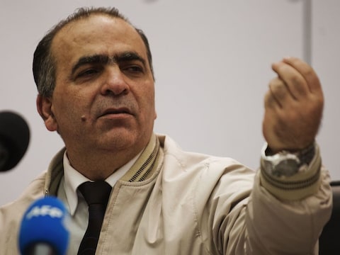 Walid Al Buni, woordvoerder van de oppositiecoalitie.