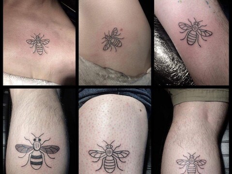 Mensen laten massaal een bij tatoeëren om de slachtoffers van de bomaanslag in Manchester te eren.