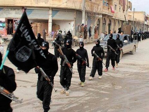 Strijders van Islamitische staat in het Syrische Raqqa in 2014.