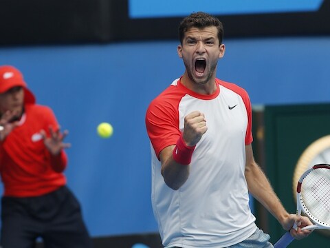 Een erg blije Grigor Dimitrov.