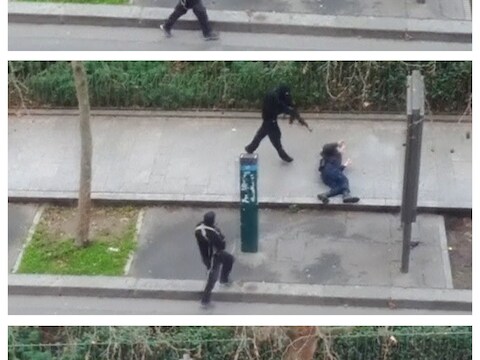 Een medewerker van Charlie Hebdo vluchtte naar het dak en filmde daar hoe de daders een agent executeerden.
