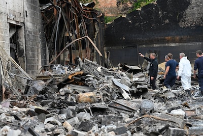 Parket bevestigt twee doden bij brand in opslagplaats in And