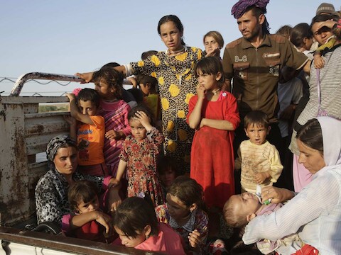 Jezidi's uit Sinjar op de vlucht voor het geweld van IS.