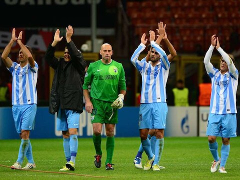 Malaga had genoeg aan een 1-1 gelijkspel bij AC Milan voor een ticket voor de achtste finales.