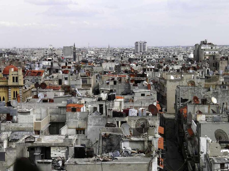 Verwoeste gebouwen in de Syrische stad Homs.