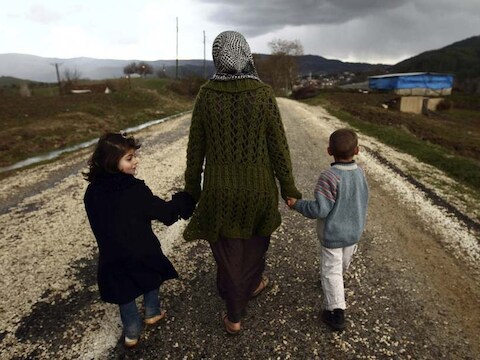 Syrische vluchtelingen bij de grens van Turkije.