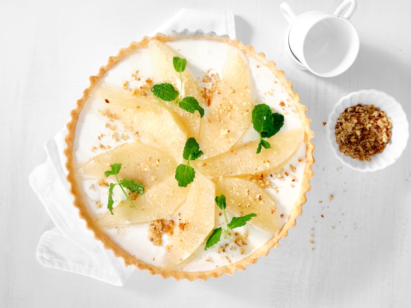 Fan van cheesecake? Deze plattekaastaart met pomelo smaakt heerlijk fris 