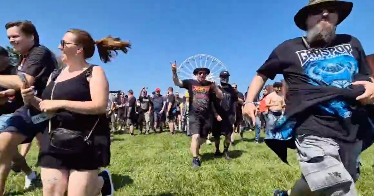 Honderden metalfans stormen de weide op: zonovergoten Graspop schiet uit de startblokken | Dessel