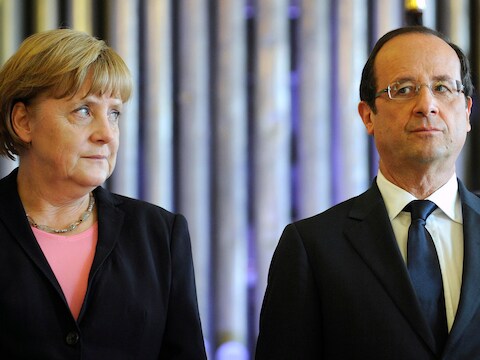 Hollande wil extra geld voor Griekenland, Merkel is daar niet over te spreken.