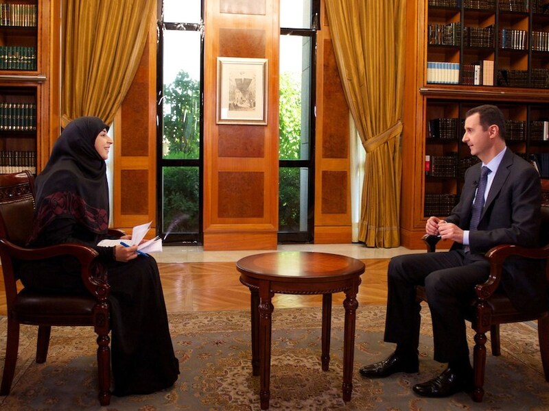 Assad tijdens het interview met het televisiestation al-Manar.