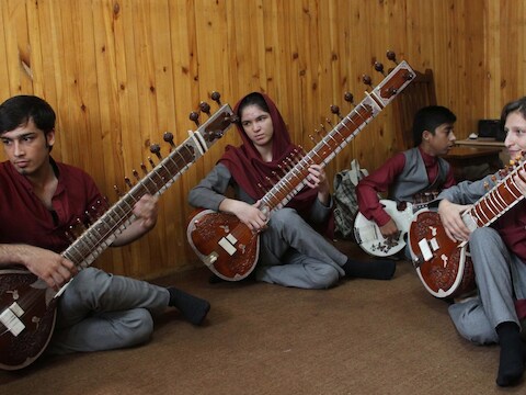 Studenten van het Afghanistan National Institute of Music in Kabul op een foto uit 2013.