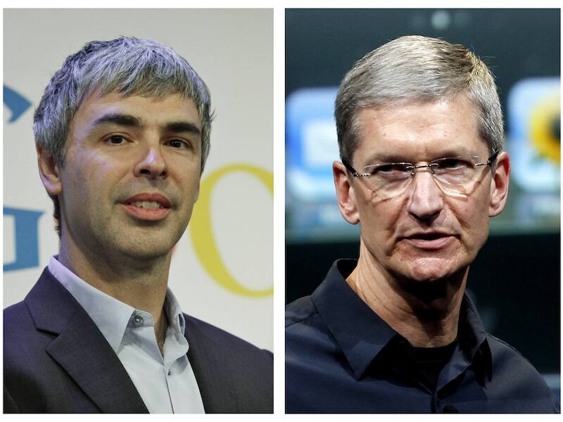Larry Page (L), topman van Google, zou over patenten praten met Tim Cook (R) van Apple.