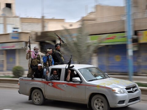 Rebellen in Raqqa, eergisteren.