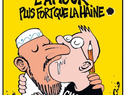 Nrc.next heeft de voorpagina in het ontwerp van een Charlie Hebdo-cover. De kop 'Liefde is sterker dan haat' staat boven een tekening van een moslim die zoent met een journalist van het tijdschrift.