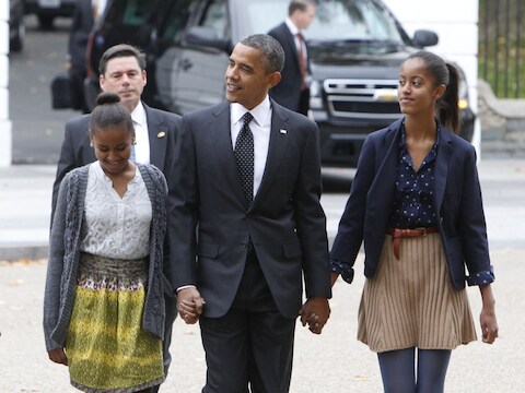 Obama met zijn dochters Sasha en Malia.