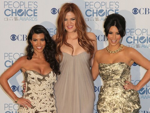 Kourtney (links), Khloé en Kim Kardashian in 2011.
