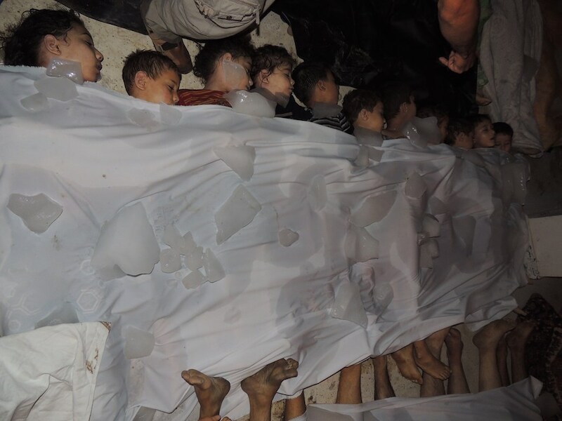 Lichamen van Syrische vrouwen en kinderen in Damascus.