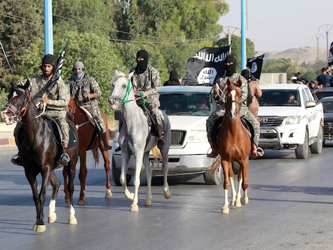 IS-strijders in de Syrische stad Raqqa.