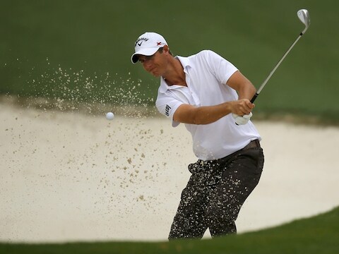Colsaerts moet ontsnappen uit een bunker op de tiende hole in Augusta.