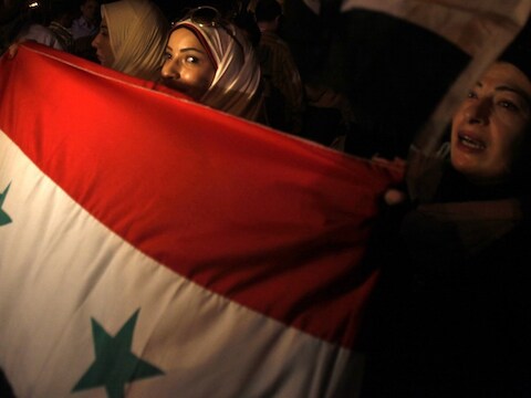 Syrische demonstranten steunen president Bashar al-Assad.